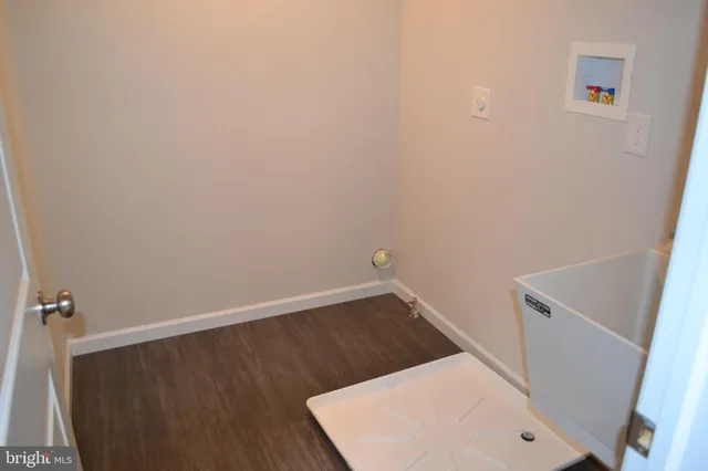 a view of small space with racks on the wall