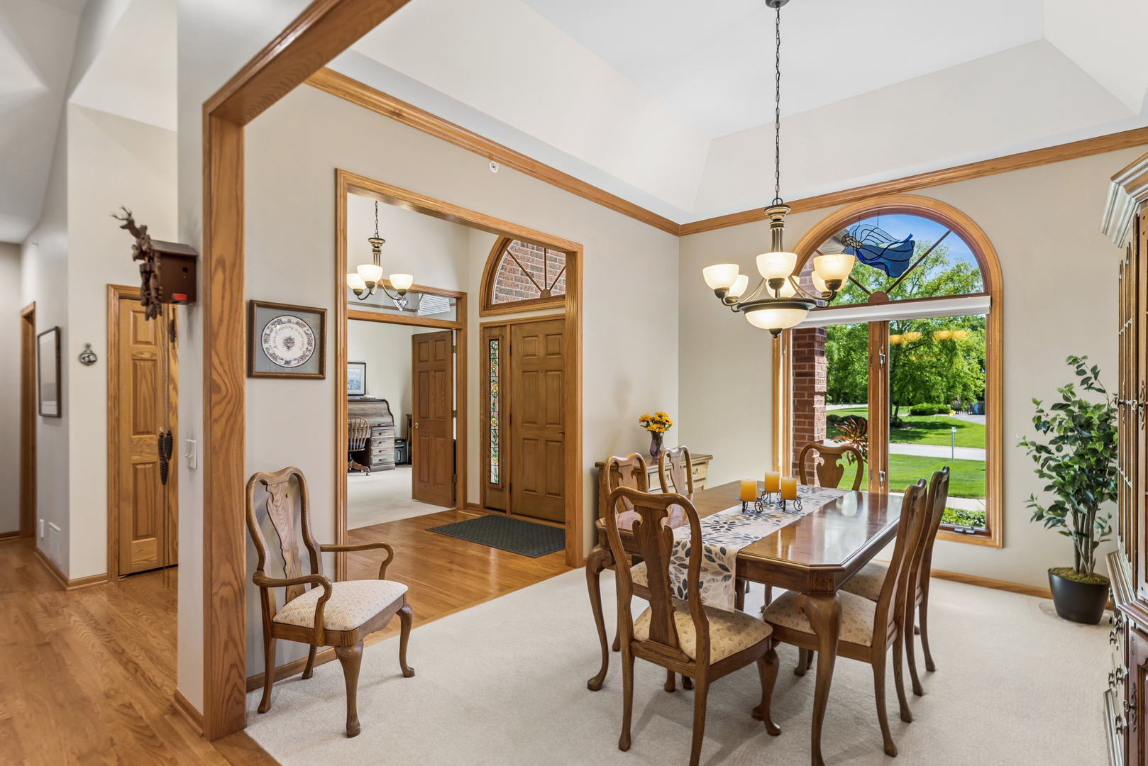 10907 Red Hawk Lane Spring Grove, IL 60071 - Photo 9 of 44 a view of a dining room with furniture window and outside view