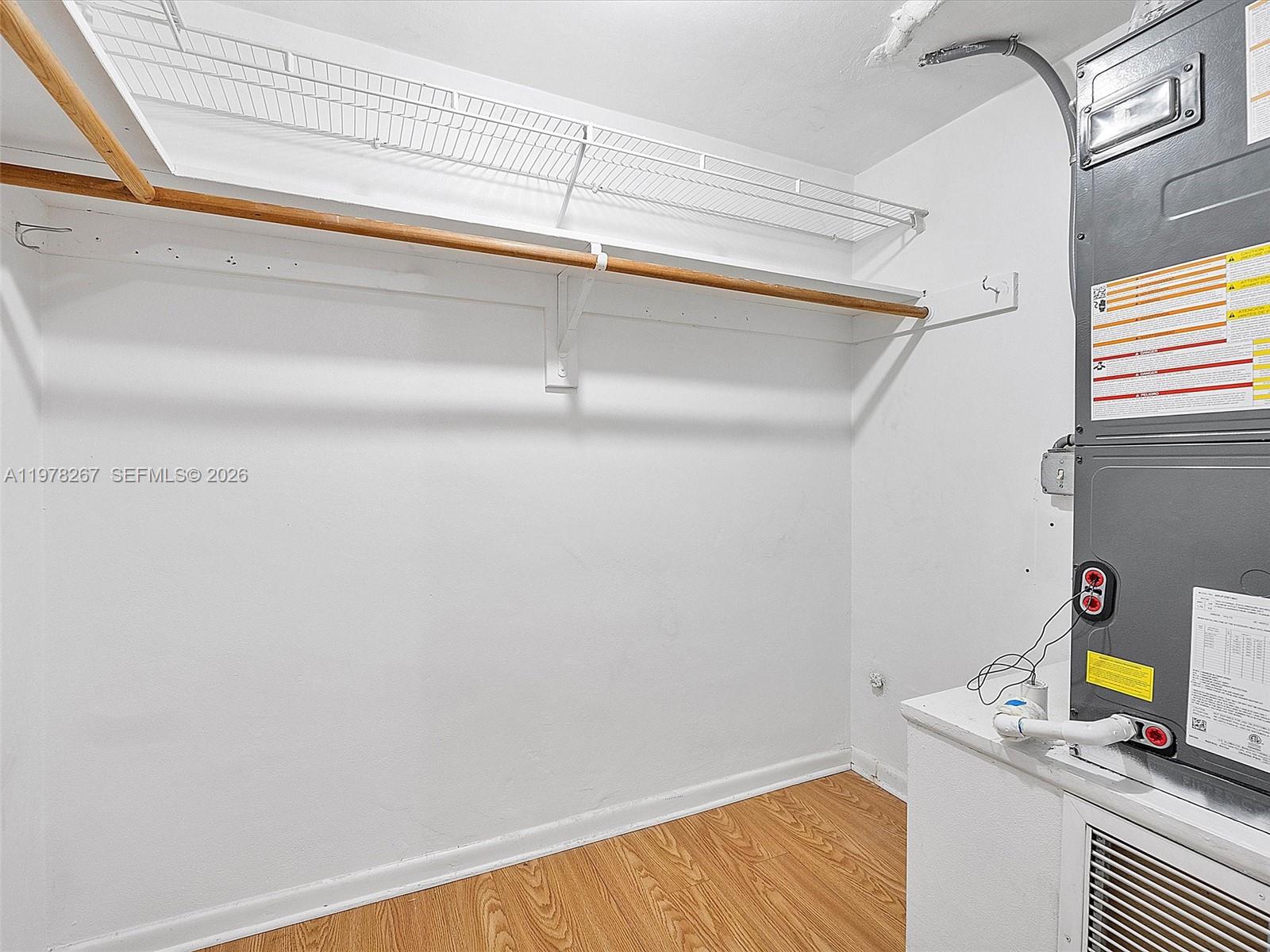 2050 Northeast 39th Street, Unit W212 Lighthouse Point, FL 33064 - Photo 9 of 17 a view of storage and utility room