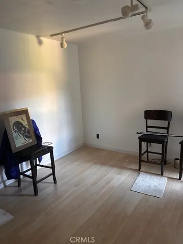 a view of a workspace with furniture