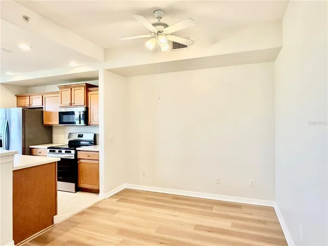 a view of a livingroom with wooden floor