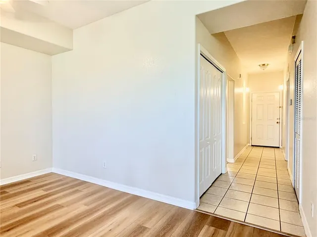 a view of front door with wooden floor