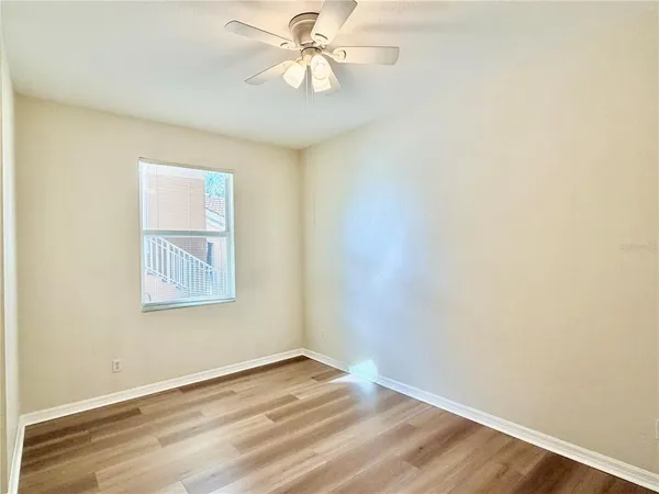 a view of a livingroom with wooden floor