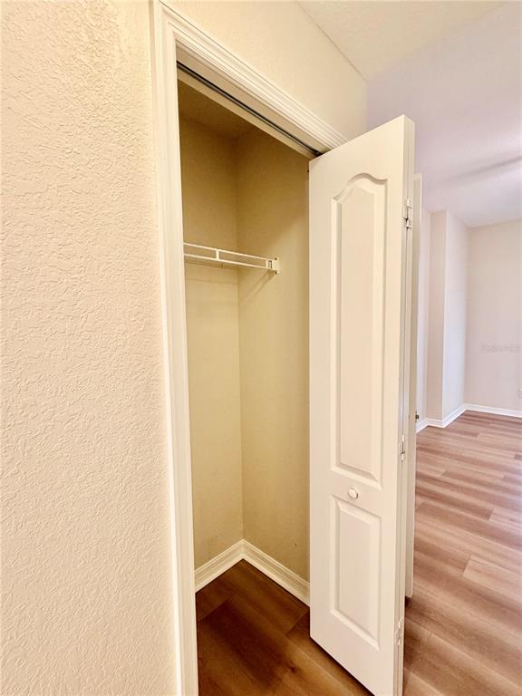 819 Fairwaycove Lane, Unit 102 Bradenton, FL 34212 - Photo 26 of 56 a view of front door with wooden floor