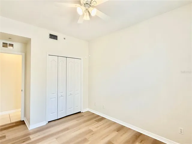 a view of a livingroom with a ceiling fan