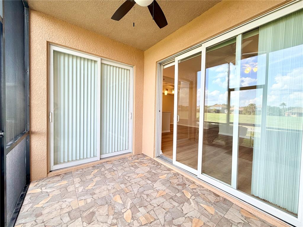 819 Fairwaycove Lane, Unit 102 Bradenton, FL 34212 - Photo 40 of 56 a view of a livingroom with a ceiling fan