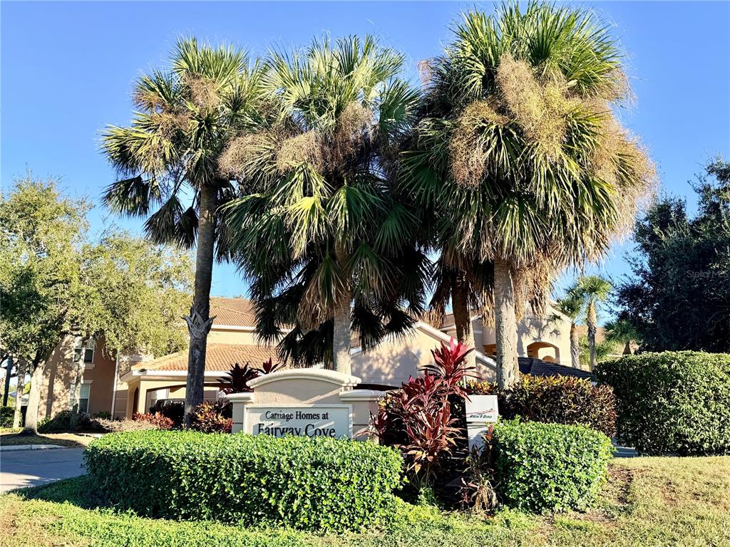 819 Fairwaycove Lane, Unit 102 Bradenton, FL 34212 - Photo 41 of 56 a view of a yard with a house