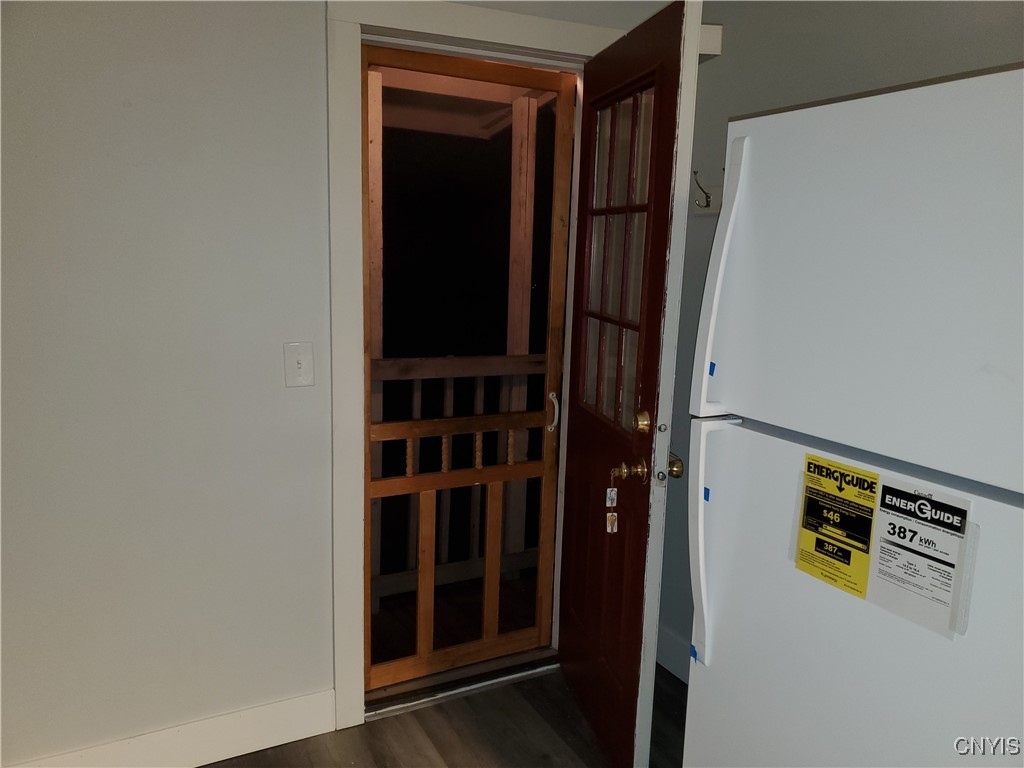 134 West Seneca Street, Unit 1 Manlius, NY 13104 - Photo 18 of 20 Screen door to the open porch for those breezy sum