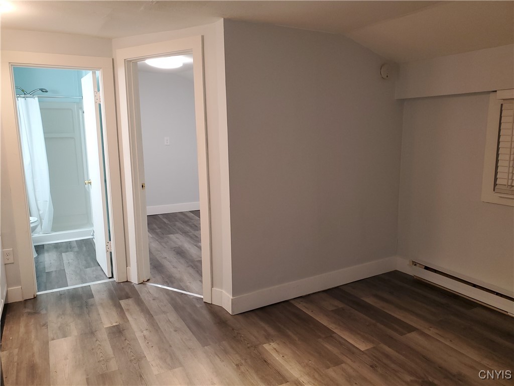 134 West Seneca Street, Unit 1 Manlius, NY 13104 - Photo 3 of 20 Looking from entry door, bath to left, bedroom to