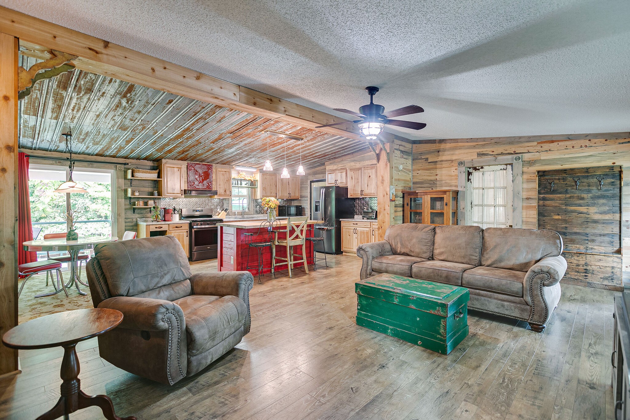 7791 Lampley Road Primm Springs, TN 38476 - Photo 14 of 32 a living room with furniture and a large window
