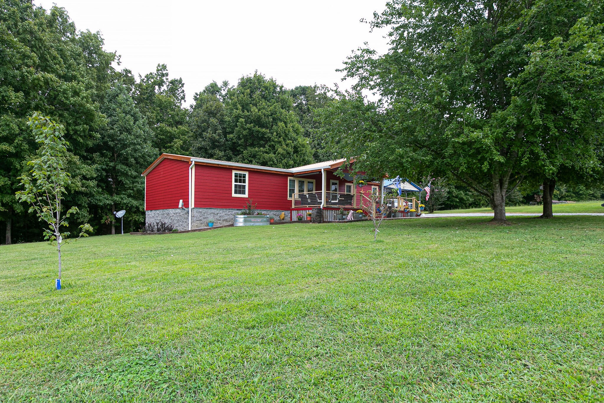 7791 Lampley Road Primm Springs, TN 38476 - Photo 4 of 32 a view of a house with a yard
