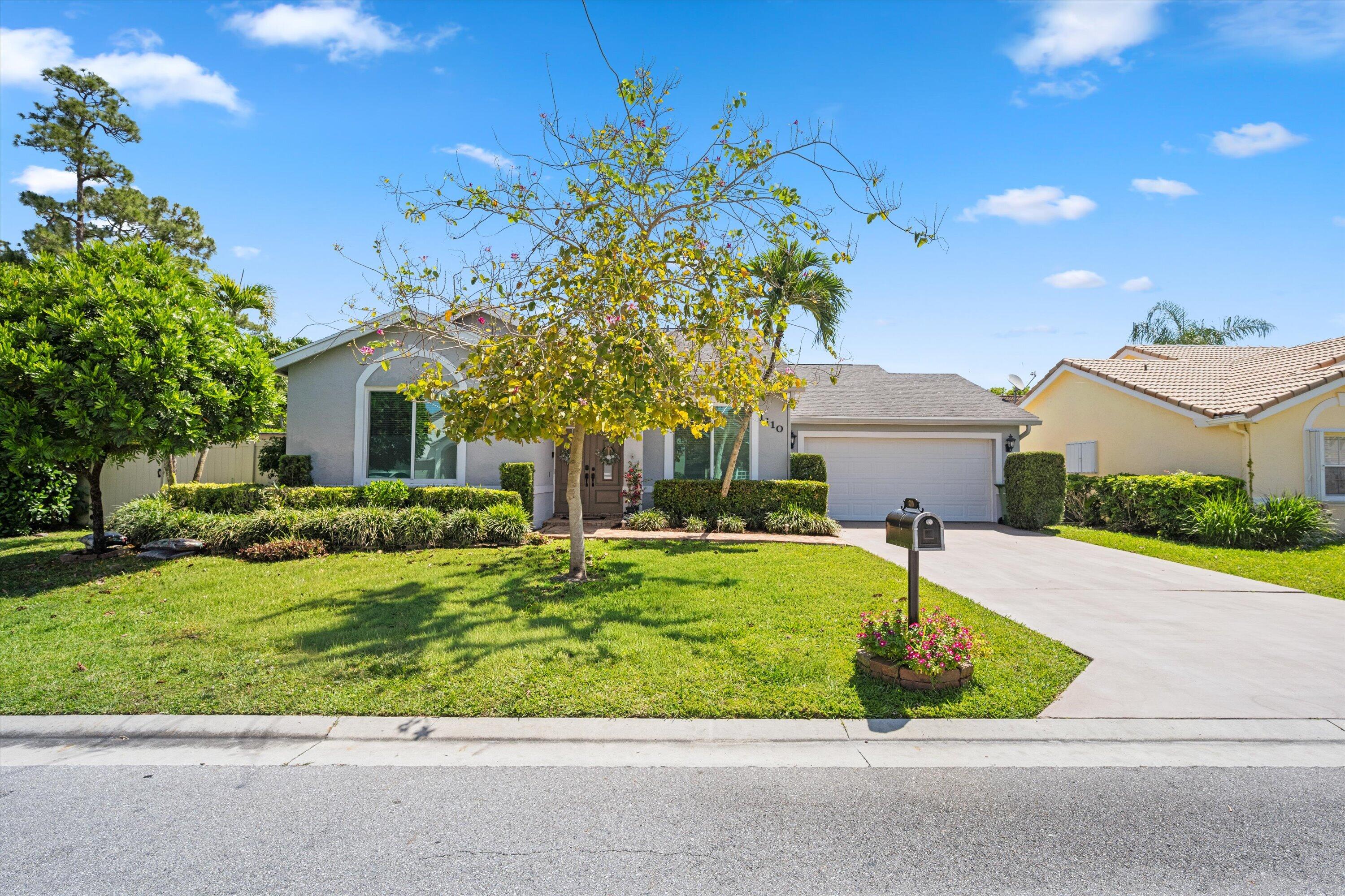 1110 Aviary Road Wellington, FL 33414 - Photo 3 of 51 Front of home