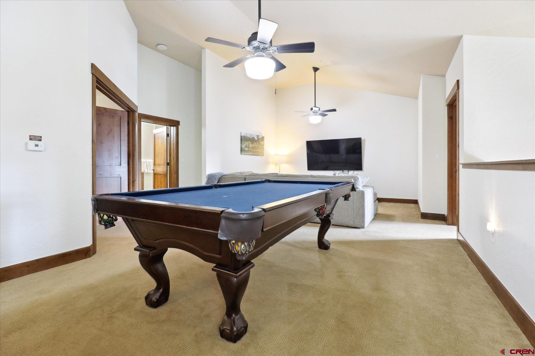24 Sheol Street, Unit R505 Durango, CO 81301 - Photo 26 of 36 a living room with pool table and windows