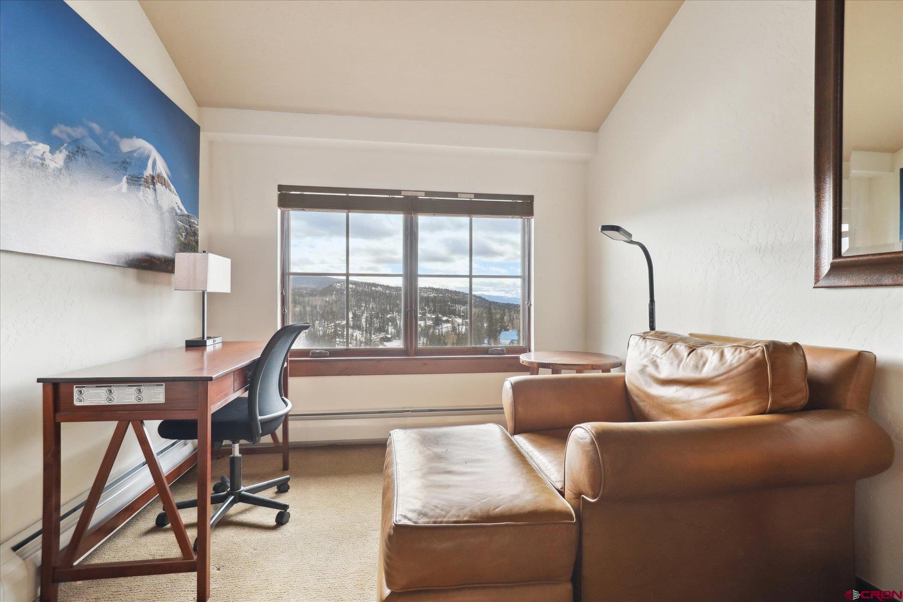 24 Sheol Street, Unit R505 Durango, CO 81301 - Photo 29 of 36 a living room with furniture and a large window