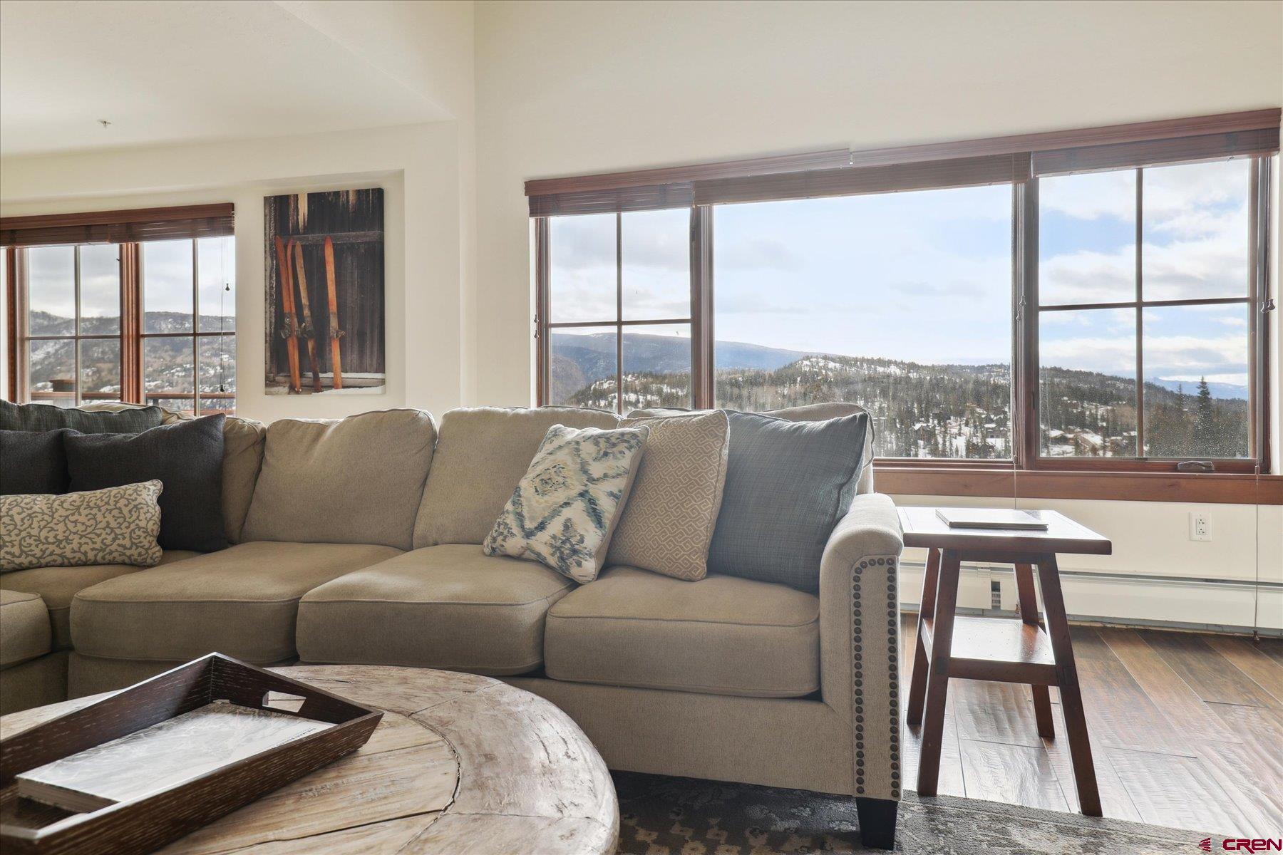 24 Sheol Street, Unit R505 Durango, CO 81301 - Photo 4 of 36 a living room with furniture and a large window