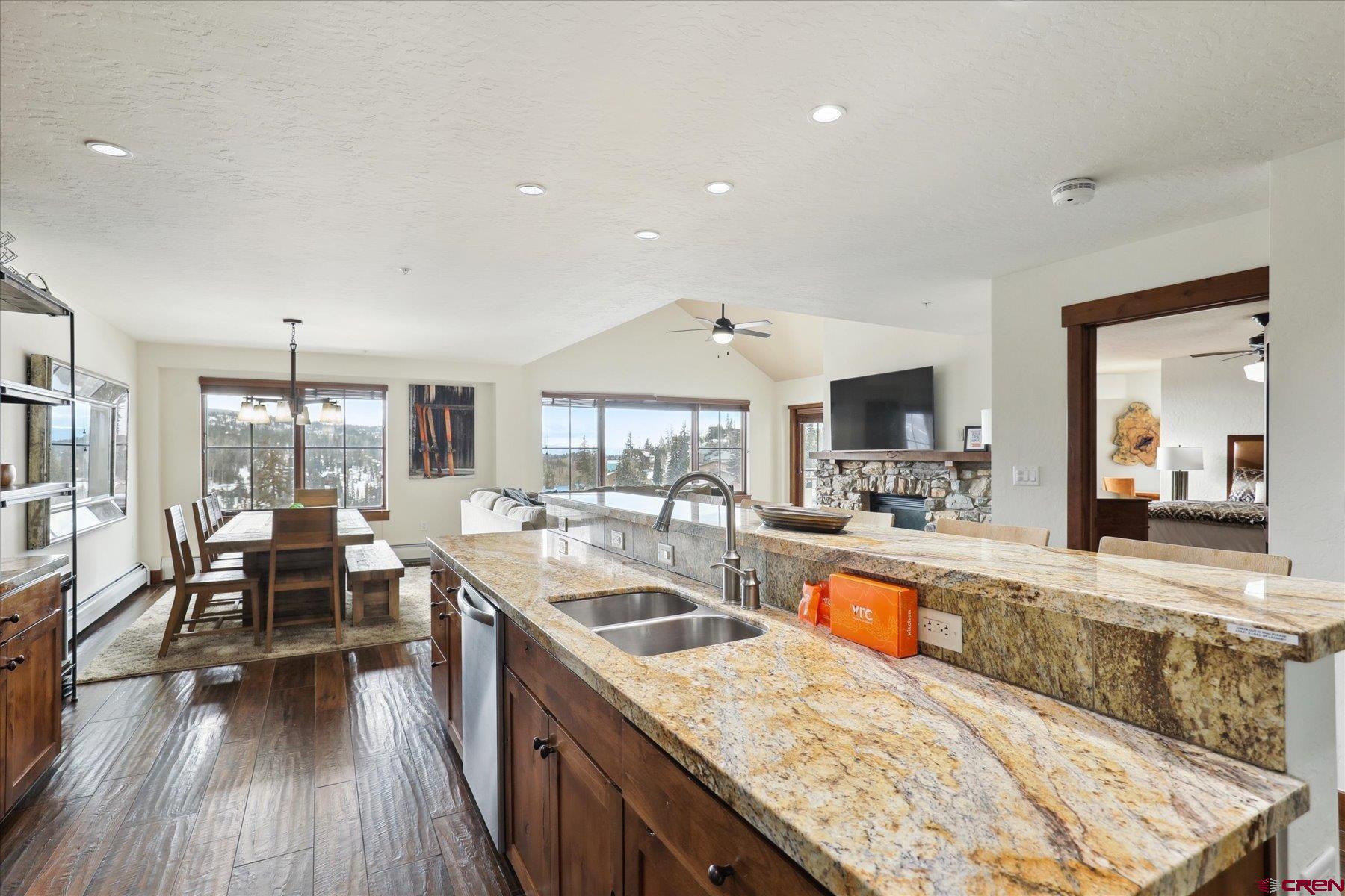 24 Sheol Street, Unit R505 Durango, CO 81301 - Photo 7 of 36 a large kitchen with kitchen island a large island in it