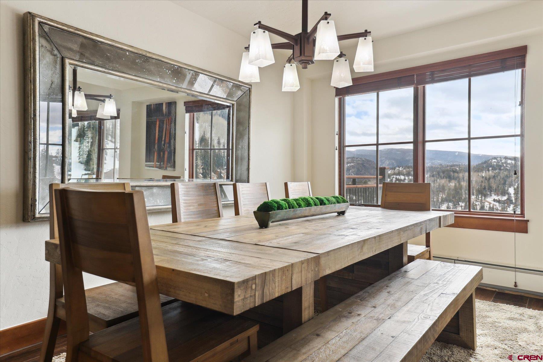 24 Sheol Street, Unit R505 Durango, CO 81301 - Photo 9 of 36 a view of a dining room with furniture window and wooden floor