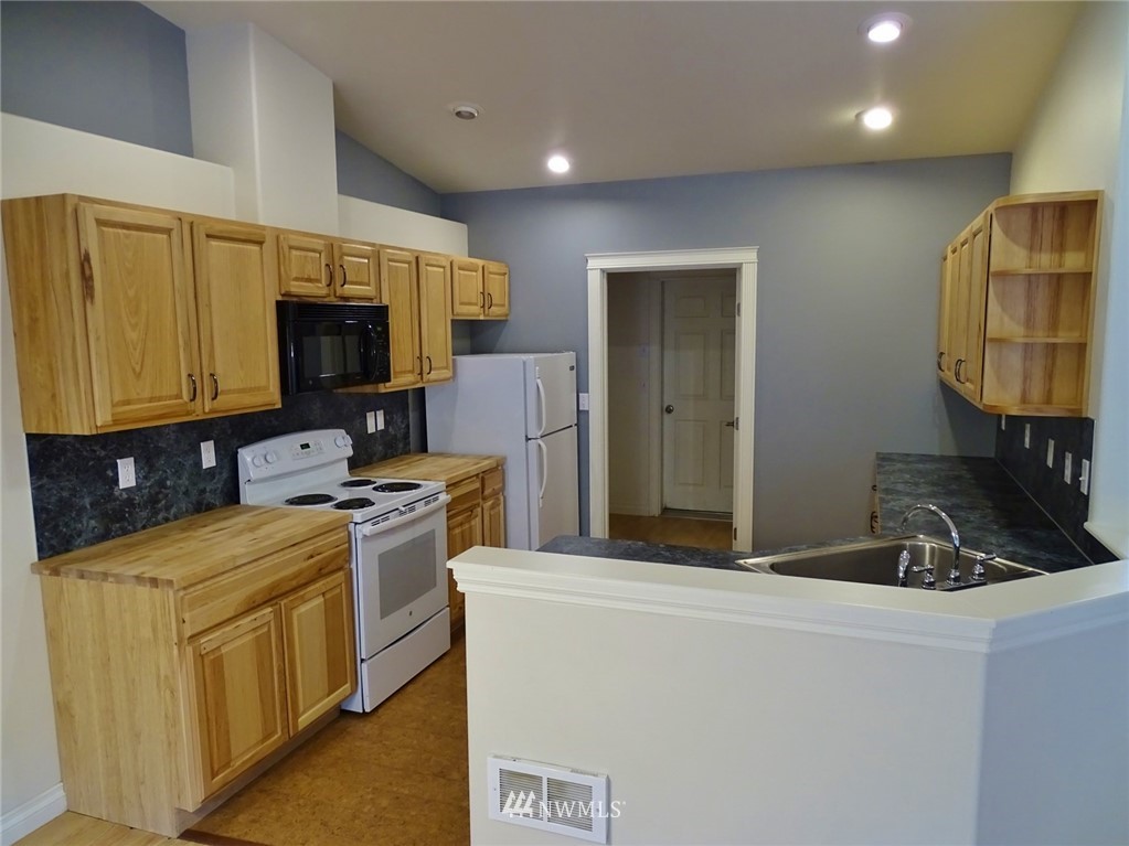 301 Harbor View Loop Southeast Ocean Shores, WA 98569 - Photo 16 of 29 a room with storage and utility