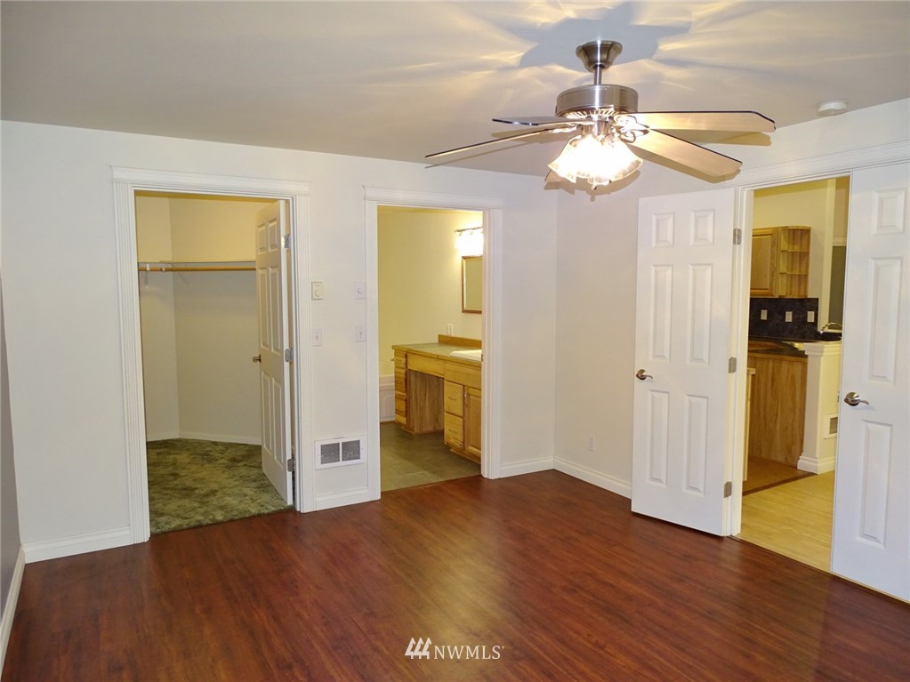 301 Harbor View Loop Southeast Ocean Shores, WA 98569 - Photo 23 of 29 a view of a livingroom with wooden floor
