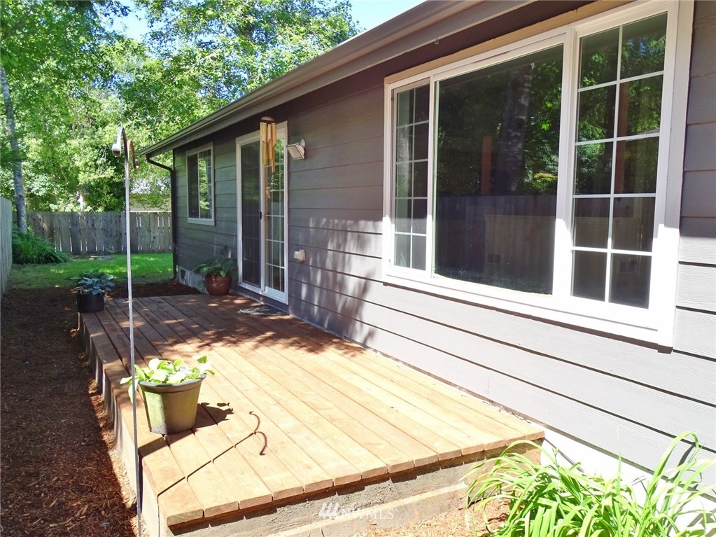 301 Harbor View Loop Southeast Ocean Shores, WA 98569 - Photo 7 of 29 a view of backyard with green space