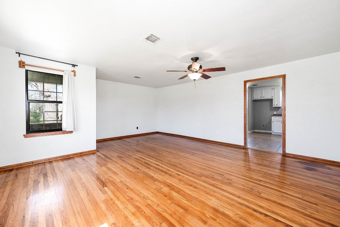 2474 Gates Road Alvin, TX 77511 - Photo 15 of 37 VIEW FROM LIVING ROOM INTO DINING ROOM/KITCHEN