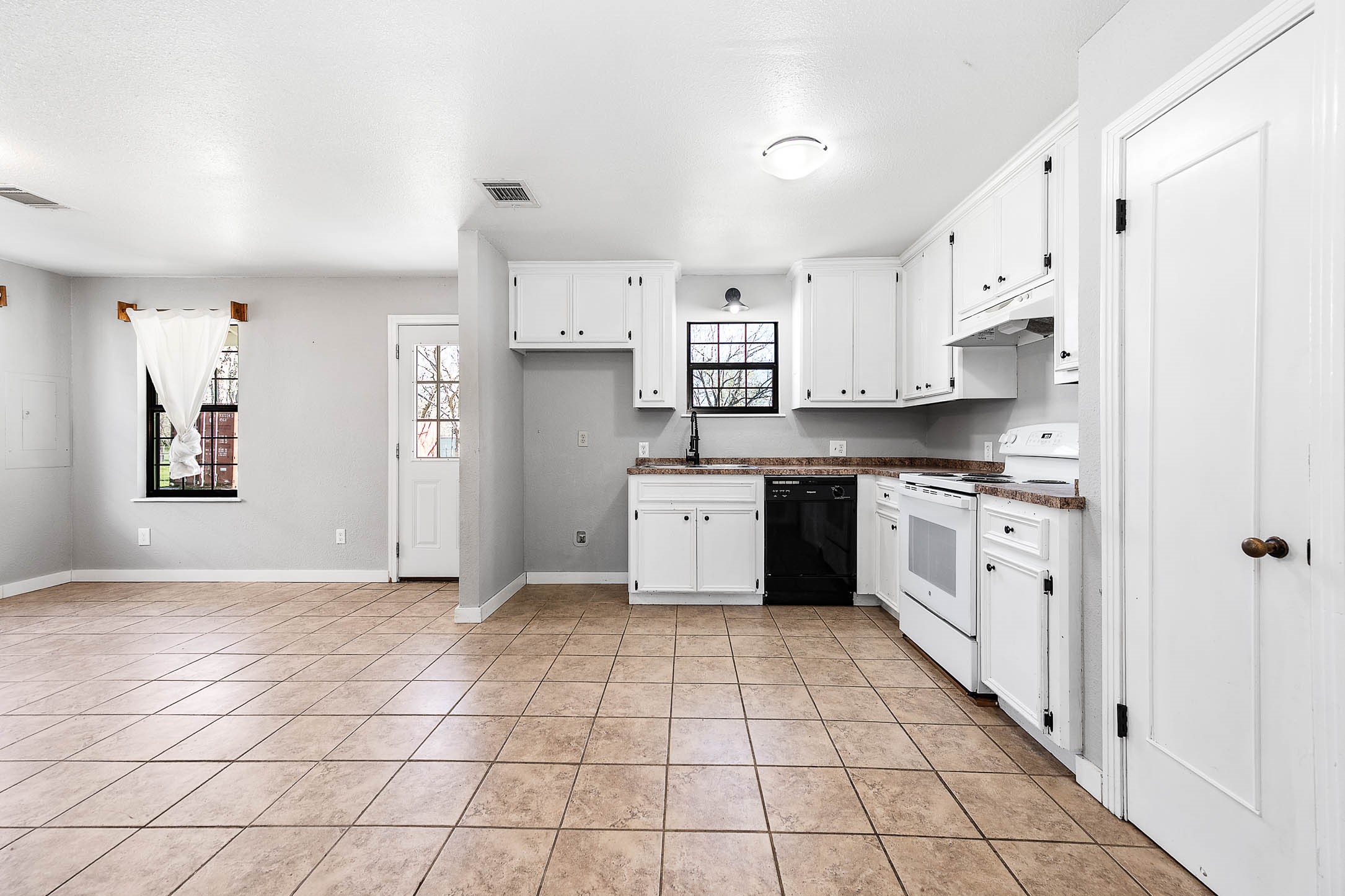 2474 Gates Road Alvin, TX 77511 - Photo 16 of 37 KITCHEN AREA WITH DISHWASHER, ELECTRIC STOVE