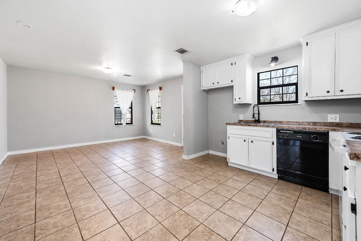 2474 Gates Road Alvin, TX 77511 - Photo 17 of 37 TILE FLOORS IN KITCHEN AND DINING AREA
