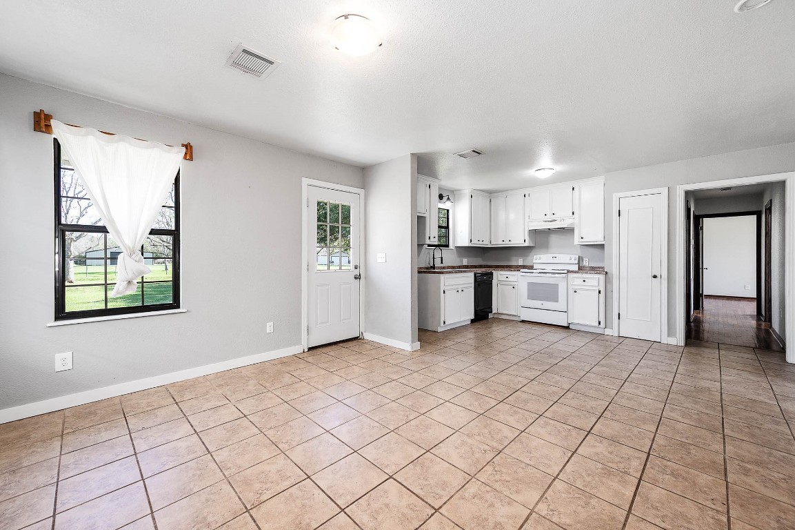 2474 Gates Road Alvin, TX 77511 - Photo 20 of 37 VIEW FROM DINING AREA DOWN THE HALL TO BATH AND BEDROOMS