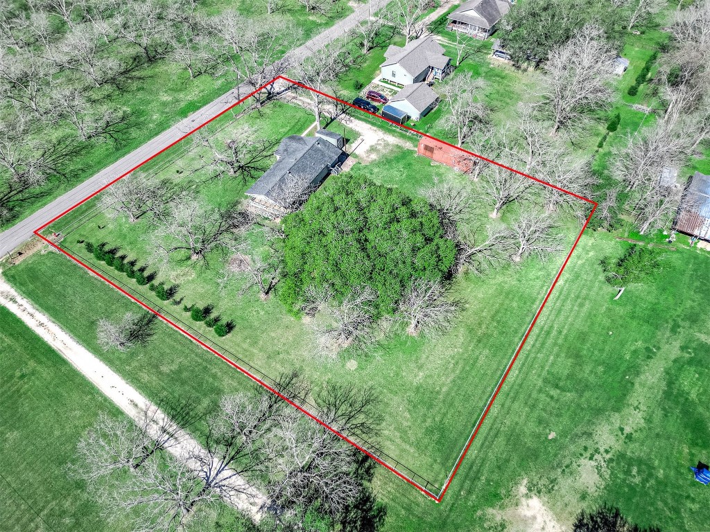 2474 Gates Road Alvin, TX 77511 - Photo 2 of 37 THIS CORNER LOT HAS THE ADVANTAGE OF HAVING CITY SERVICES IN THE COUNTRY.