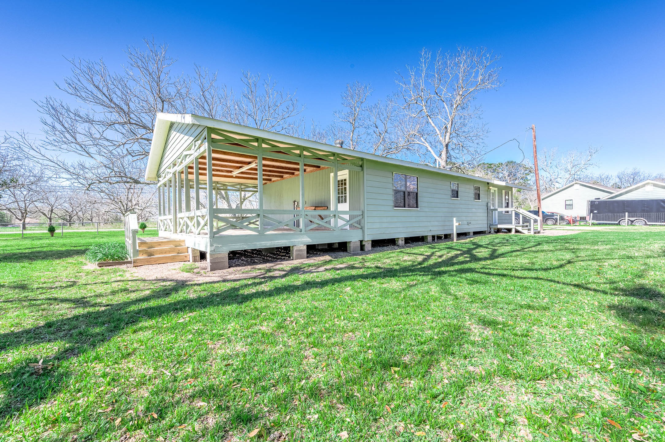 2474 Gates Road Alvin, TX 77511 - Photo 28 of 37 BACK VIEW OF HOME FEATURING THE LARGE PORCH AREA
