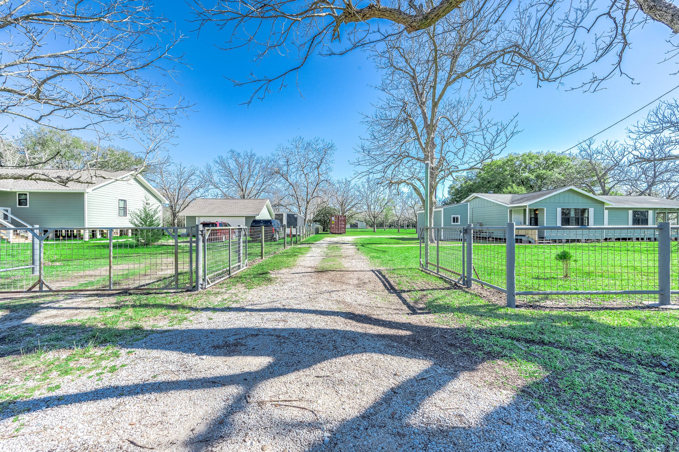 2474 Gates Road Alvin, TX 77511 - Photo 3 of 37 WE HAVE A FULLY FENCED PROPERTY, WITH DOUBLE WIDE GATE ACCESS