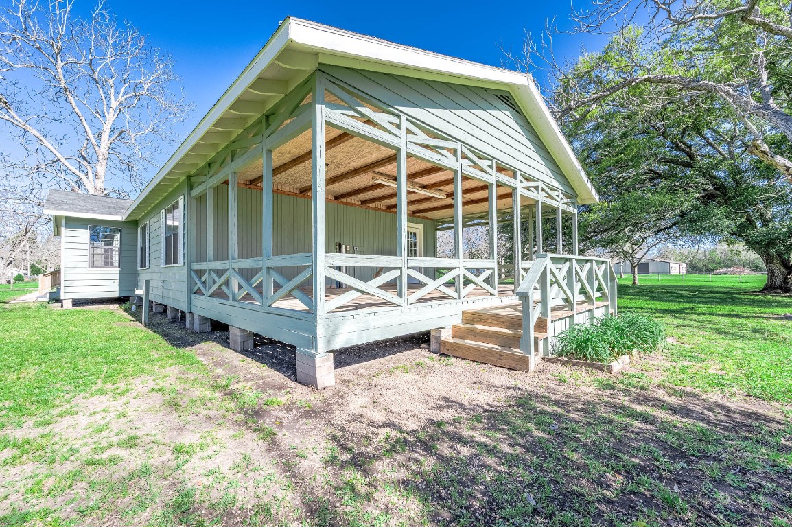 2474 Gates Road Alvin, TX 77511 - Photo 8 of 37 THE PORCH HAS CONNECTIONS FOR WASHER & DRYER, NEXT TO THE HOUSE