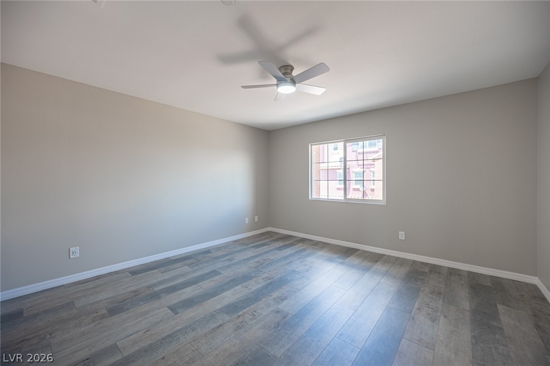 9916 Sable Point Street Las Vegas, NV 89178 - Photo 44 of 73 A quiet retreat with durable flooring and a refreshing ceiling fan for comfort.