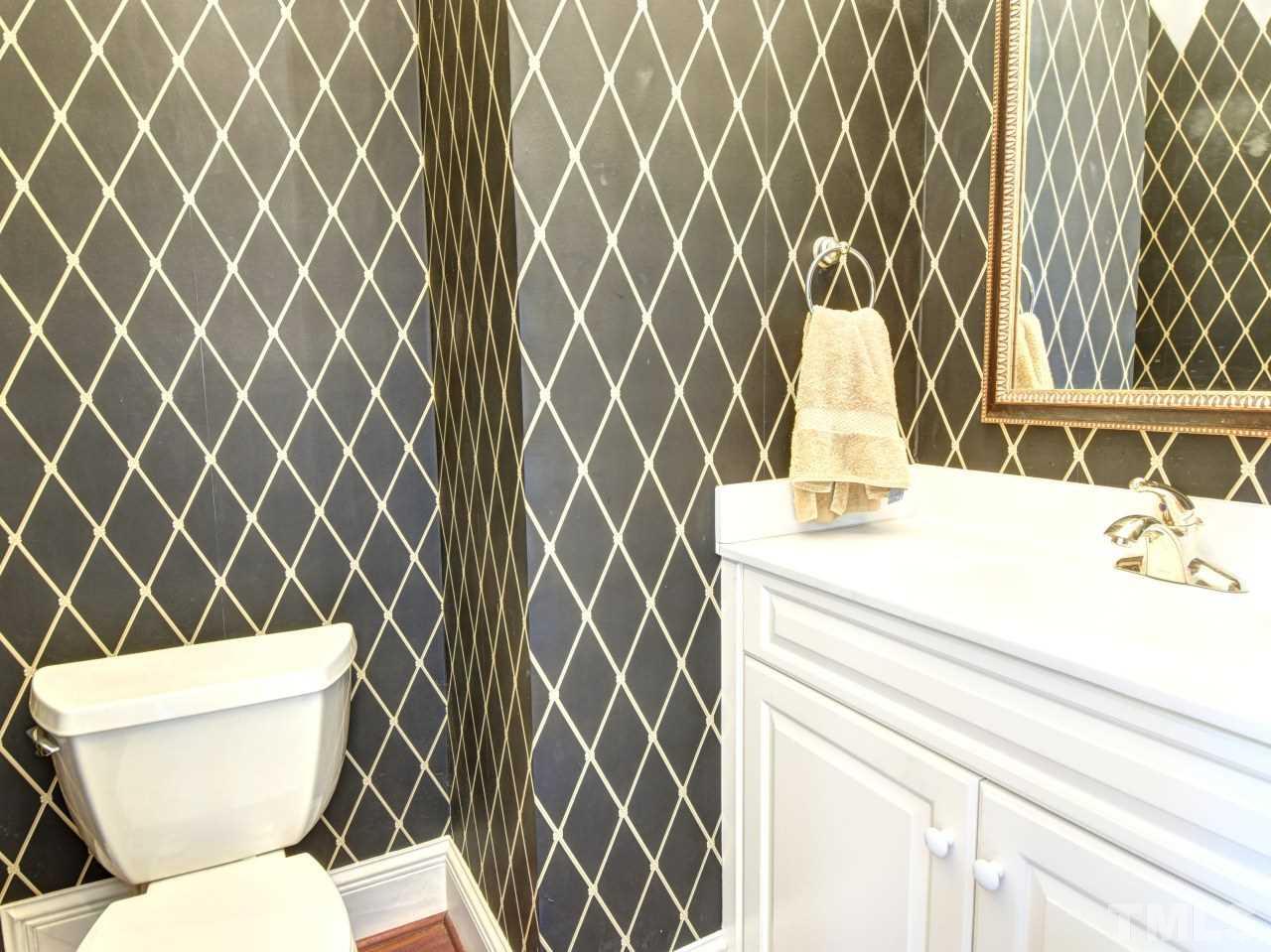 302 Marlowe Road Raleigh, NC 27609 - Photo 12 of 25 1st level bath, HW floors