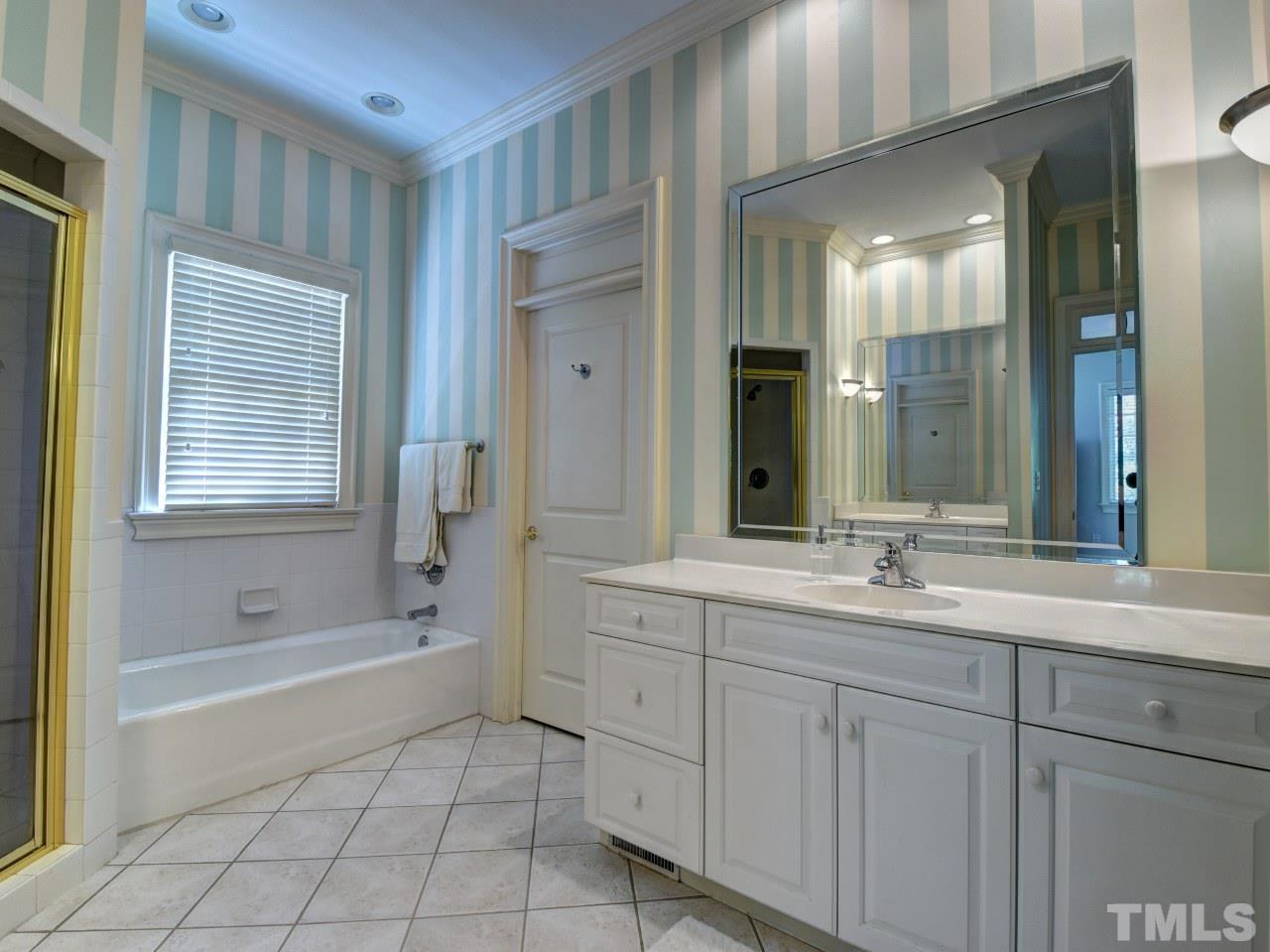 302 Marlowe Road Raleigh, NC 27609 - Photo 14 of 25 main level MBR bath.