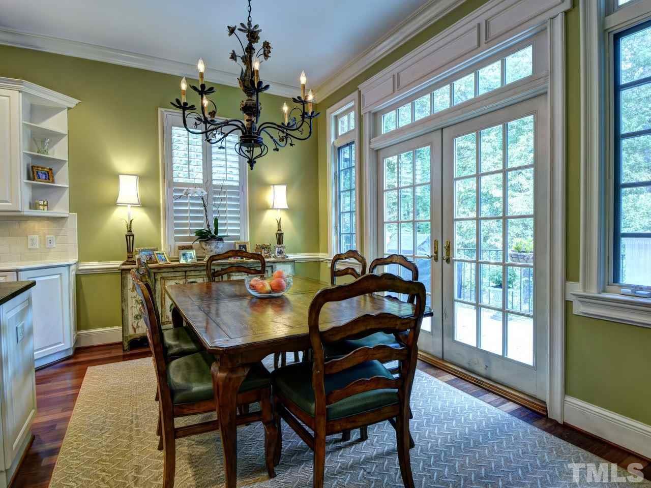 302 Marlowe Road Raleigh, NC 27609 - Photo 5 of 25 Large breakfast area, French doors lead to deck