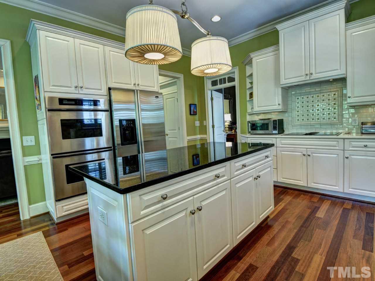 302 Marlowe Road Raleigh, NC 27609 - Photo 6 of 25 Brazilian Cherry HW floors, two wall ovens, NEW (2017) Bosch Dishwasher, NEW disposal.