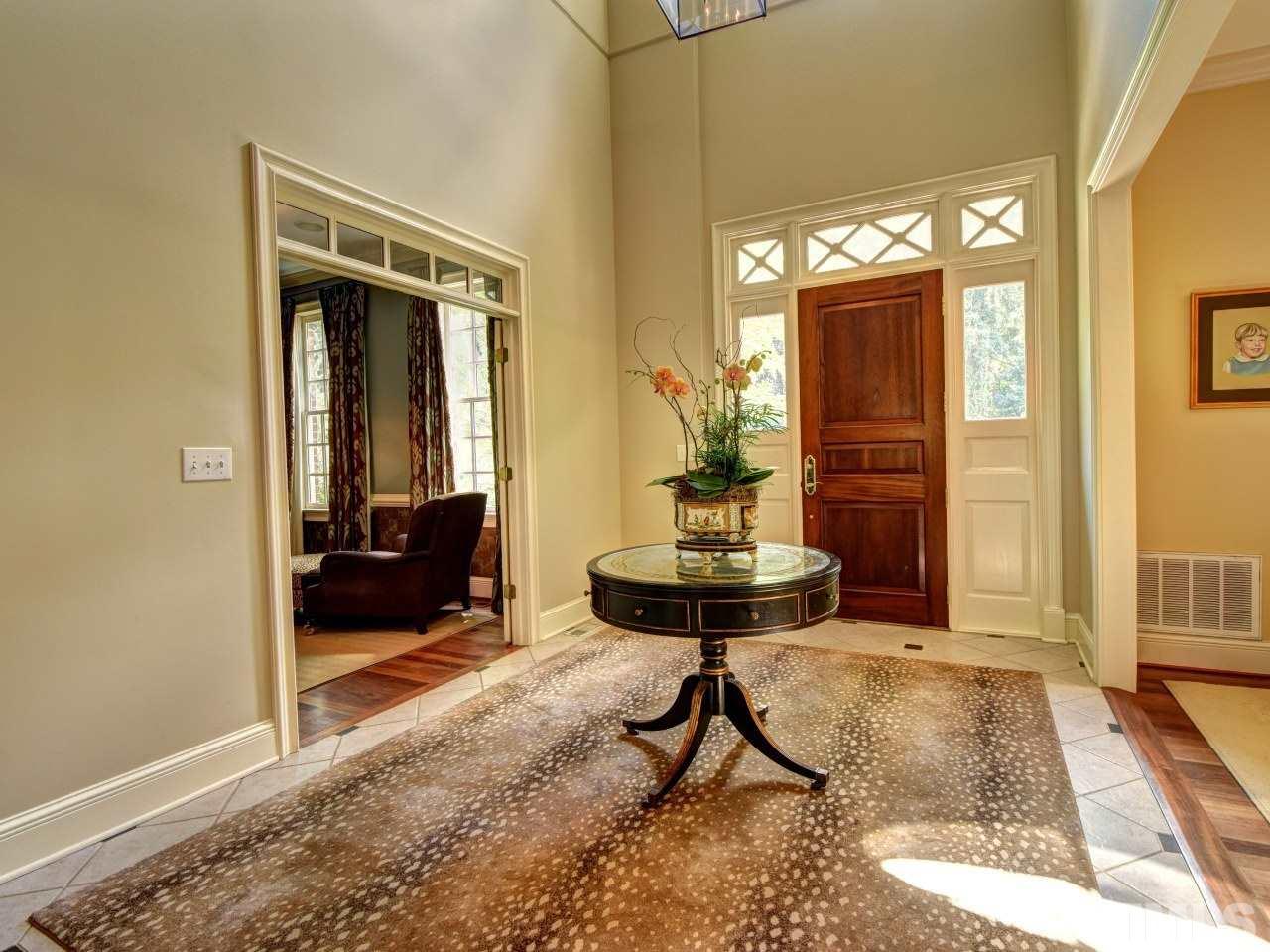 302 Marlowe Road Raleigh, NC 27609 - Photo 10 of 25 Transitional Foyer with tile floor.