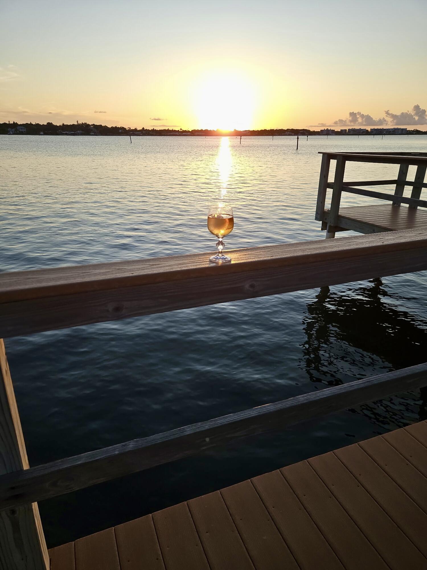 1982 Southwest Palm City Road, Unit F Stuart, FL 34994 - Photo 26 of 34 a view of ocean from a balcony