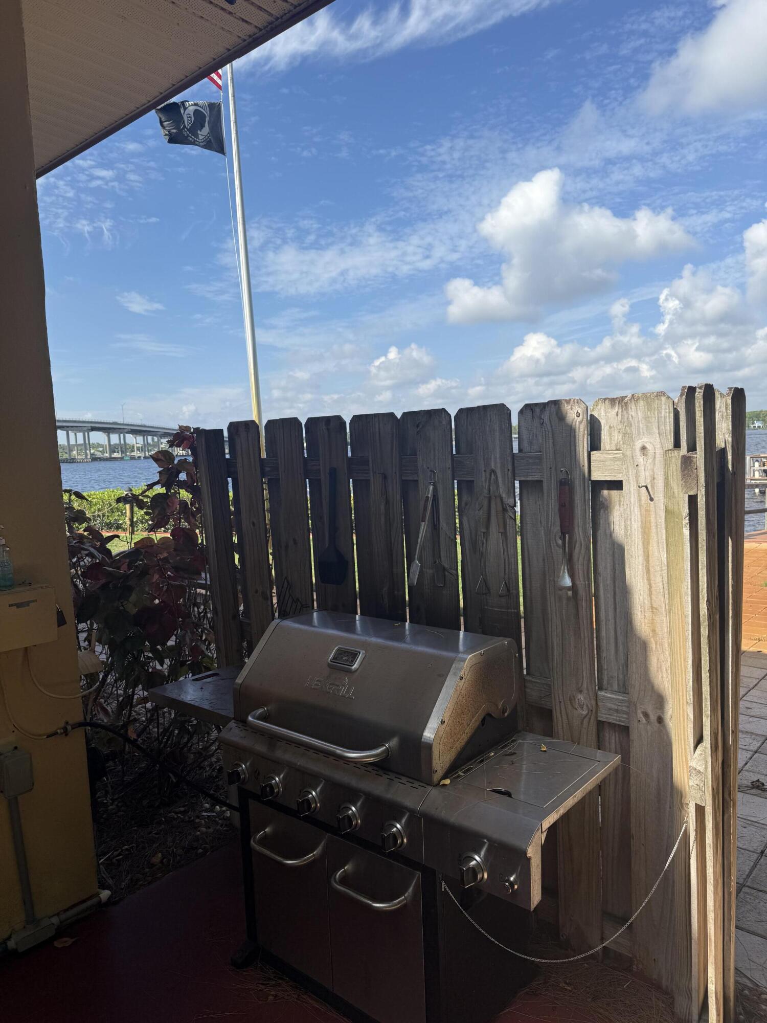 1982 Southwest Palm City Road, Unit F Stuart, FL 34994 - Photo 29 of 34 a view of outdoor space and seating