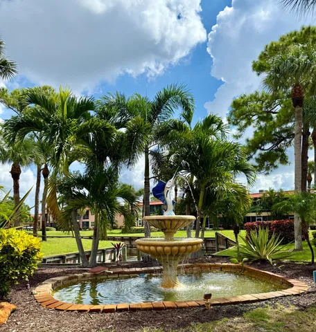 a view of a house with a swimming pool