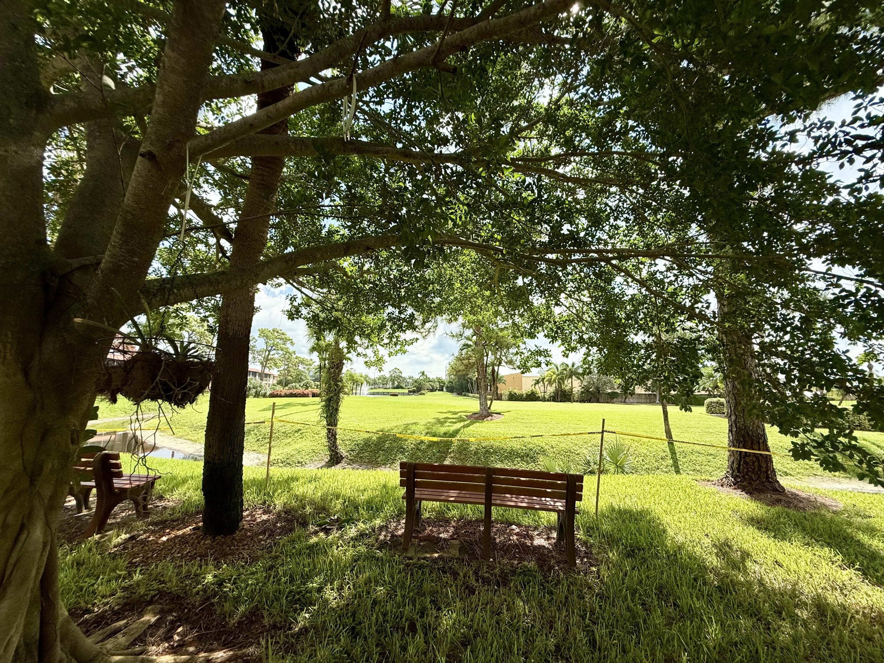 1982 Southwest Palm City Road, Unit F Stuart, FL 34994 - Photo 31 of 34 a view of an outdoor space and yard