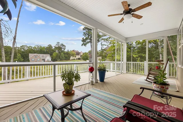 a view of a porch with furniture