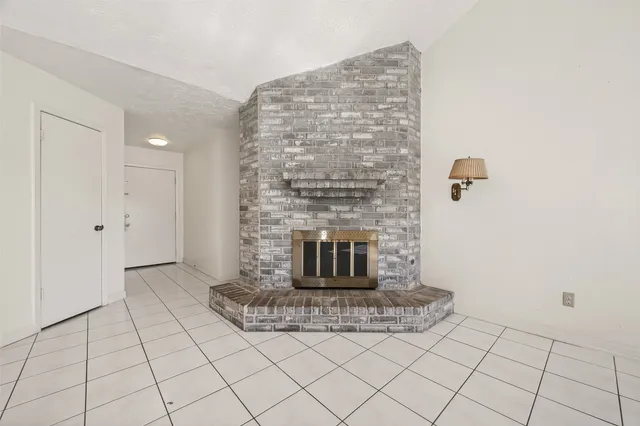 a view of a fireplace in kitchen