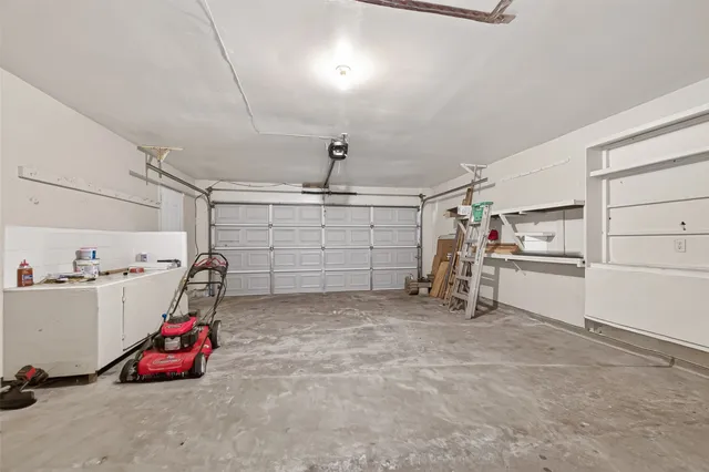 a view of a garage with furniture