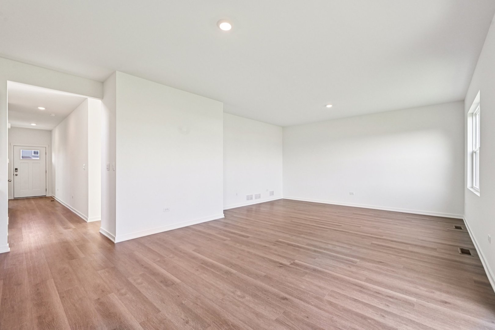 6722 Applegate Drive Plainfield, IL 60586 - Photo 18 of 45 a view of an empty room with wooden floor and closet
