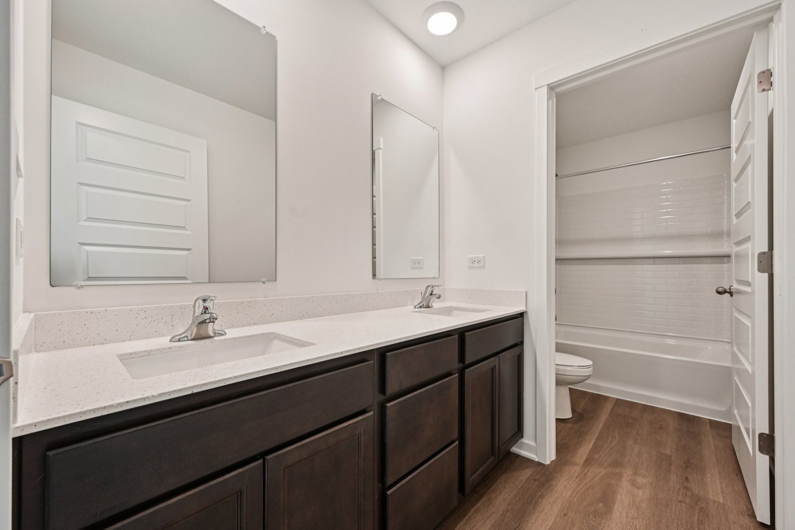 6722 Applegate Drive Plainfield, IL 60586 - Photo 21 of 45 a bathroom with a sink and a mirror