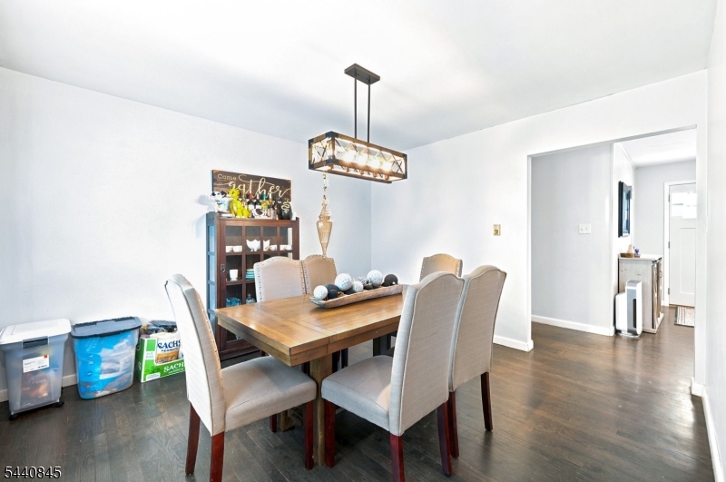 36 Forest Road Andover, NJ 07821 - Photo 32 of 50 a view of a dining room with furniture and wooden floor