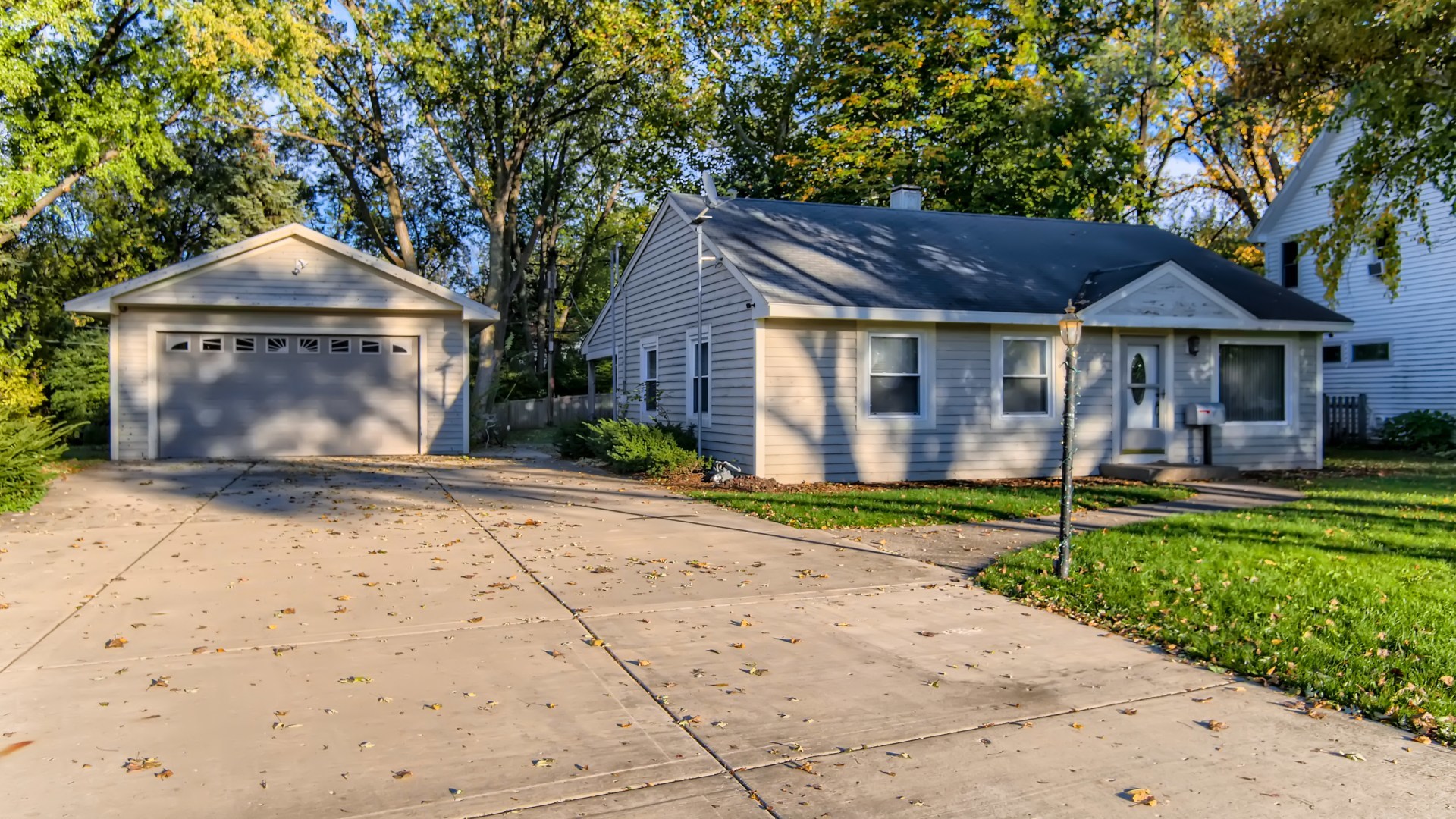 171 Raupp Boulevard Buffalo Grove, IL 60089 - Photo 1 of 23 a front view of a house with a yard