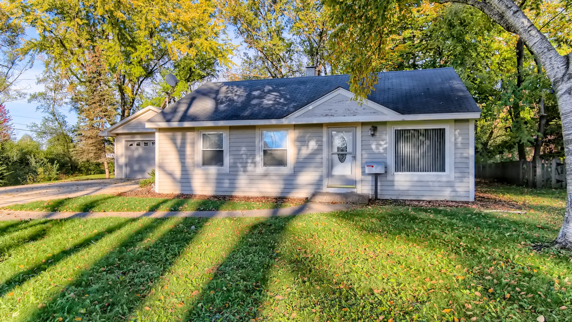 171 Raupp Boulevard Buffalo Grove, IL 60089 - Photo 2 of 23 a front view of house with yard and green space